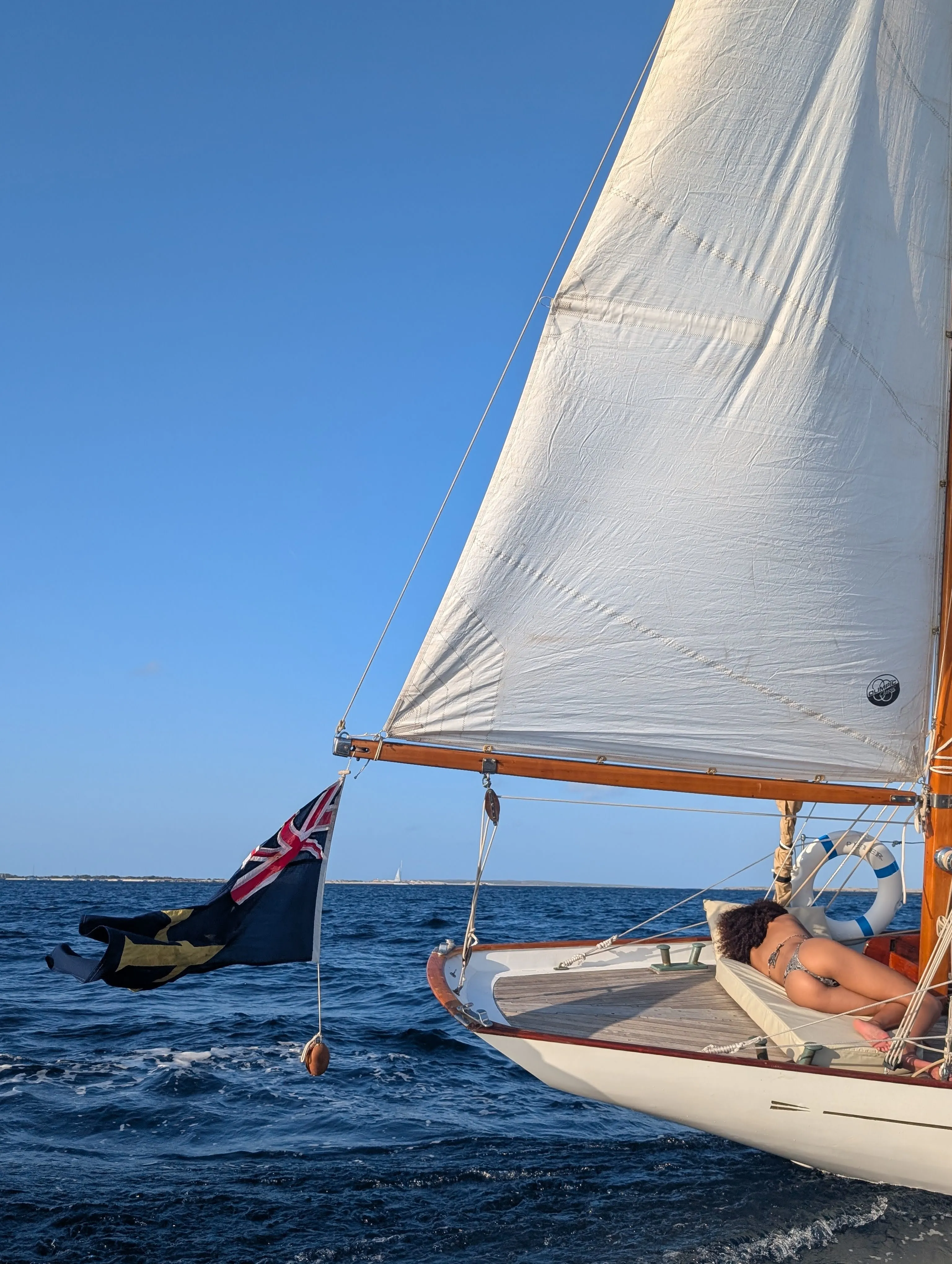 Peter, a 1939 classic yacht, under full sail off Ibiza